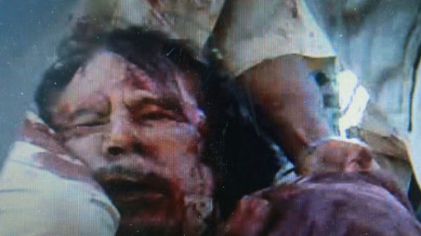 Погребаха Муамар Кадафи