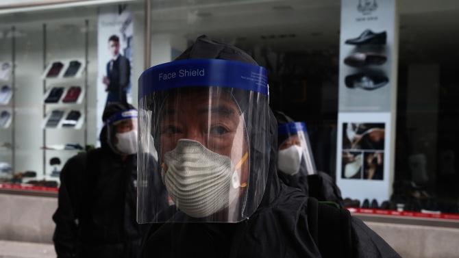 Глоби за пътници без маски в Южна Корея