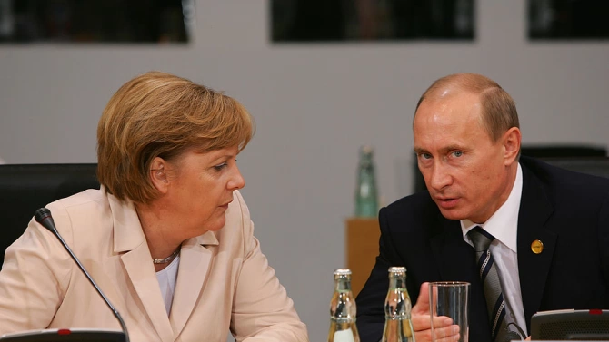 Германският канцлер и руският президент Владимир Путин Владимир Путин