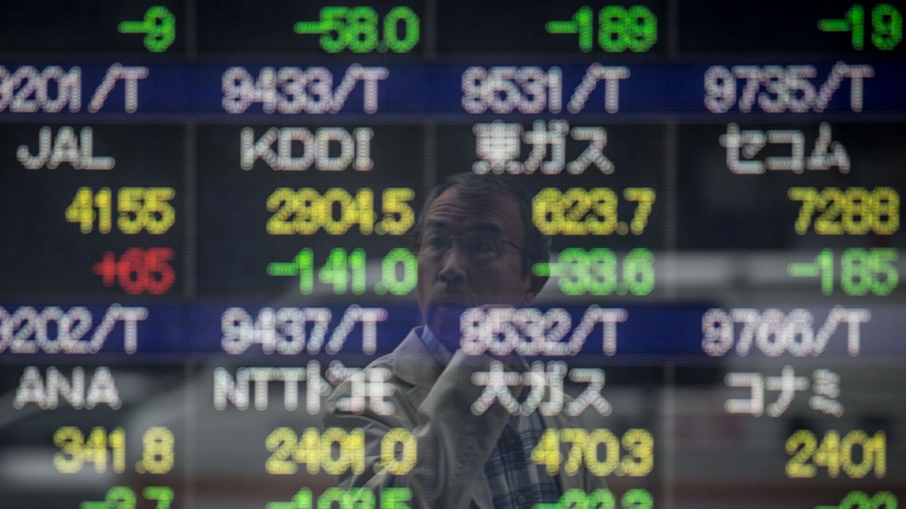 Токийската борса закри без значителна промяна, Уолстрийт приключи смесено